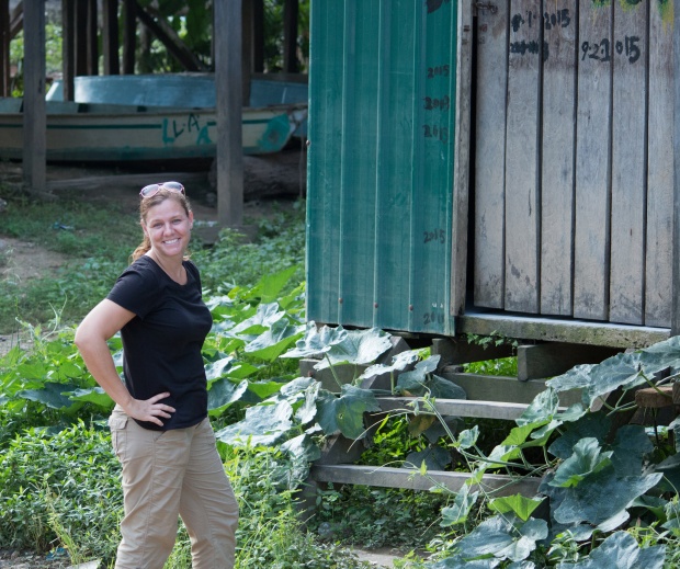 Standing in front of an outhouse in Borneo glamour shot