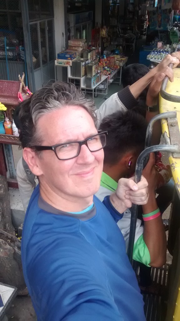 Hanging on the back of a songtheow selfie